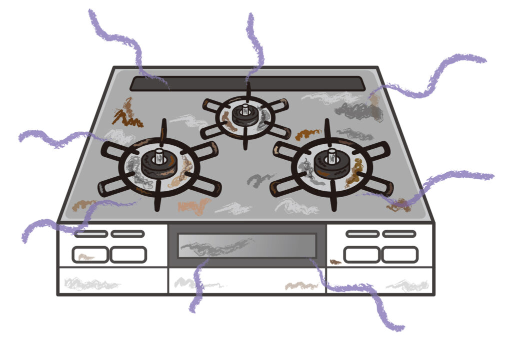 焦げ付きや、油汚れで覆われてしまっている、キッチンガスコンロの画像